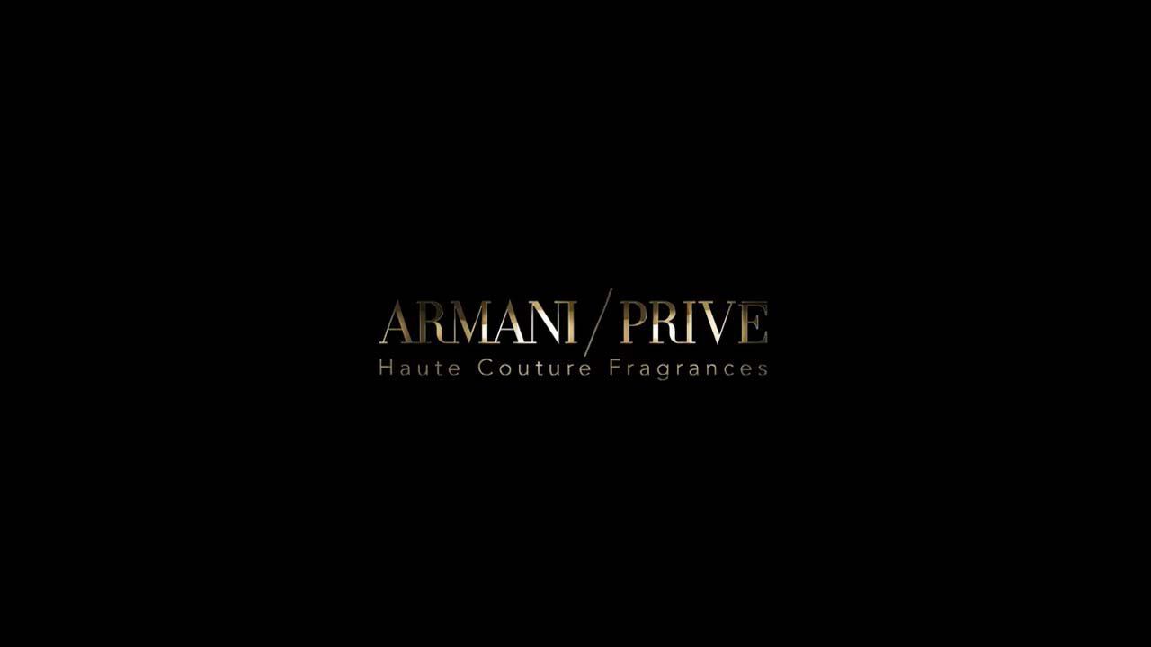 Alt text: Logo of Armani Prive Haute Couture Fragrances on a black background.
