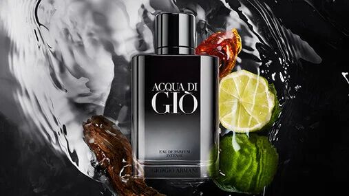 Armani fragrance bottle with bergamot, amberwood, patchouli and water elements, illustrating the blend of fresh and woody notes.